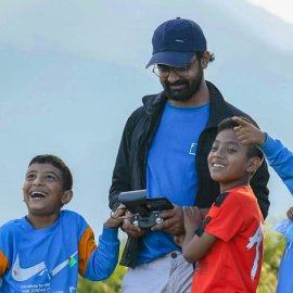 Nepal Local kids having a fun time trying to point out position of the drone