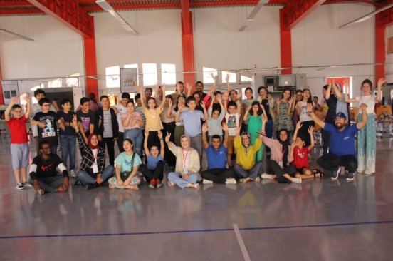 Happy participants take a group photo with the Morocco Flying Labs team.