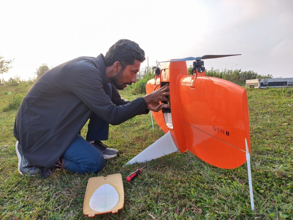 A drone pilot preparing for the mission